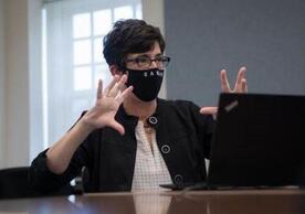 Dean Sarah B. Drummond teaches a class while masked